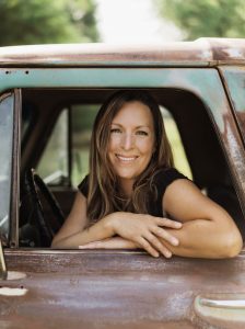 AuthorPhoto(Angela Hanses sitting inside a truck)WEB-(by-Angela-Rethwisch-Photography)